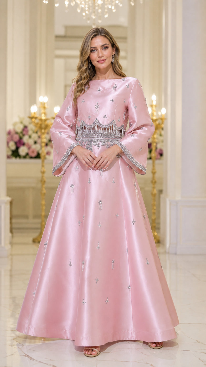 Front view of model wearing pink beaded satin maxi dress