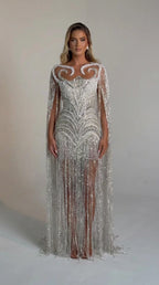 Front view of the silver beaded fringe cape evening gown