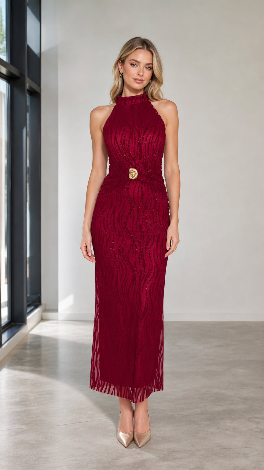 Front view of burgundy halter neck maxi dress with gold belt