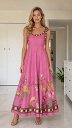 Front full view of pink floral maxi dress on model