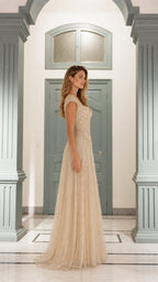 Side profile of champagne evening dress
