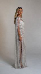 Side profile view of the silver beaded evening gown