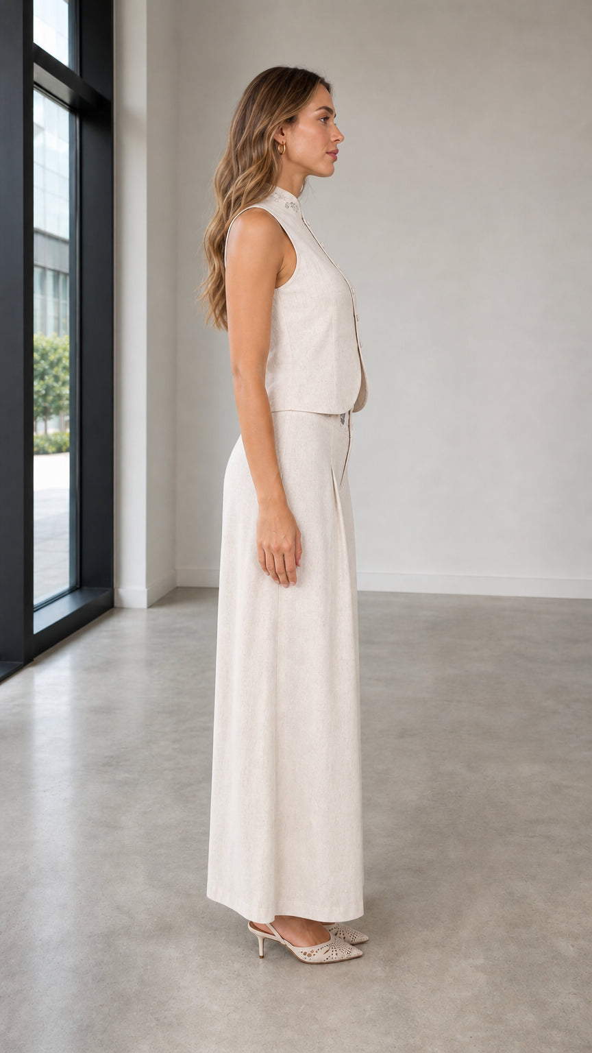 Side profile view of woman wearing beige two-piece set