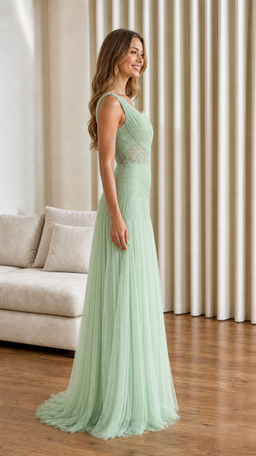 Side profile view of sage green tulle evening dress