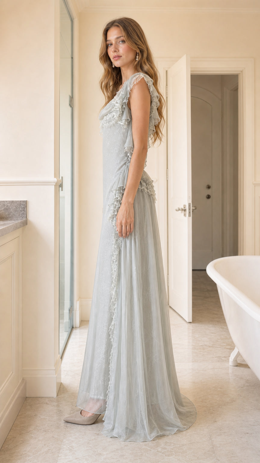Side profile of model in sage evening gown