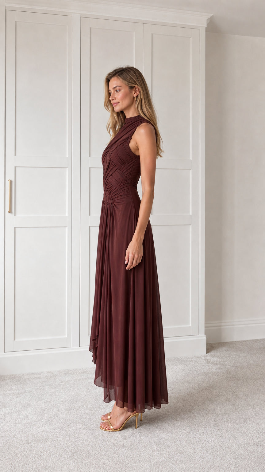 Side profile of burgundy pleated maxi dress