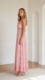 Side profile view of pink floral maxi dress