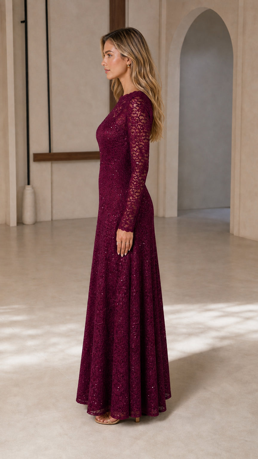 Side profile view of burgundy lace maxi dress