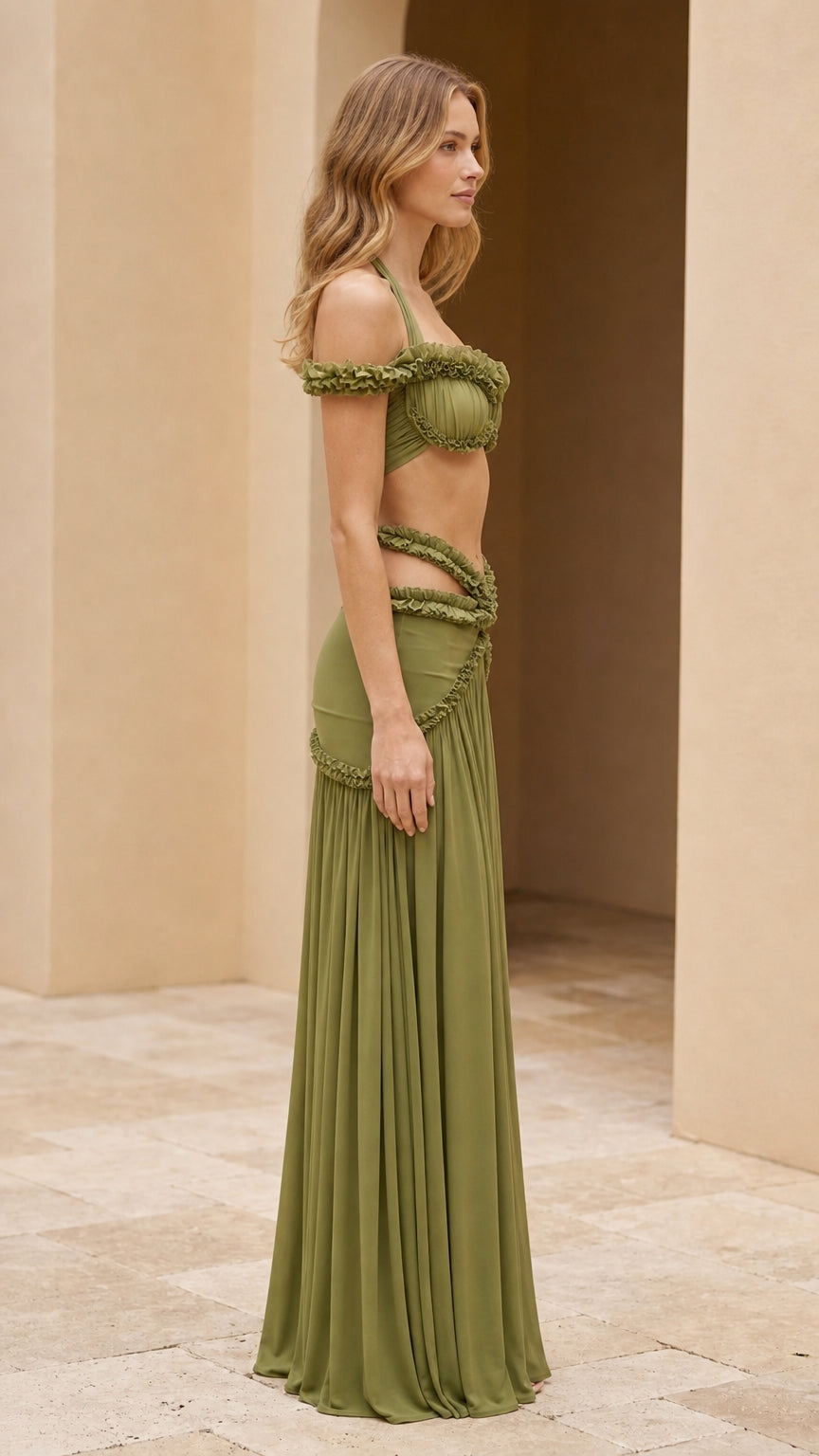 Side view of model in olive green two-piece maxi set