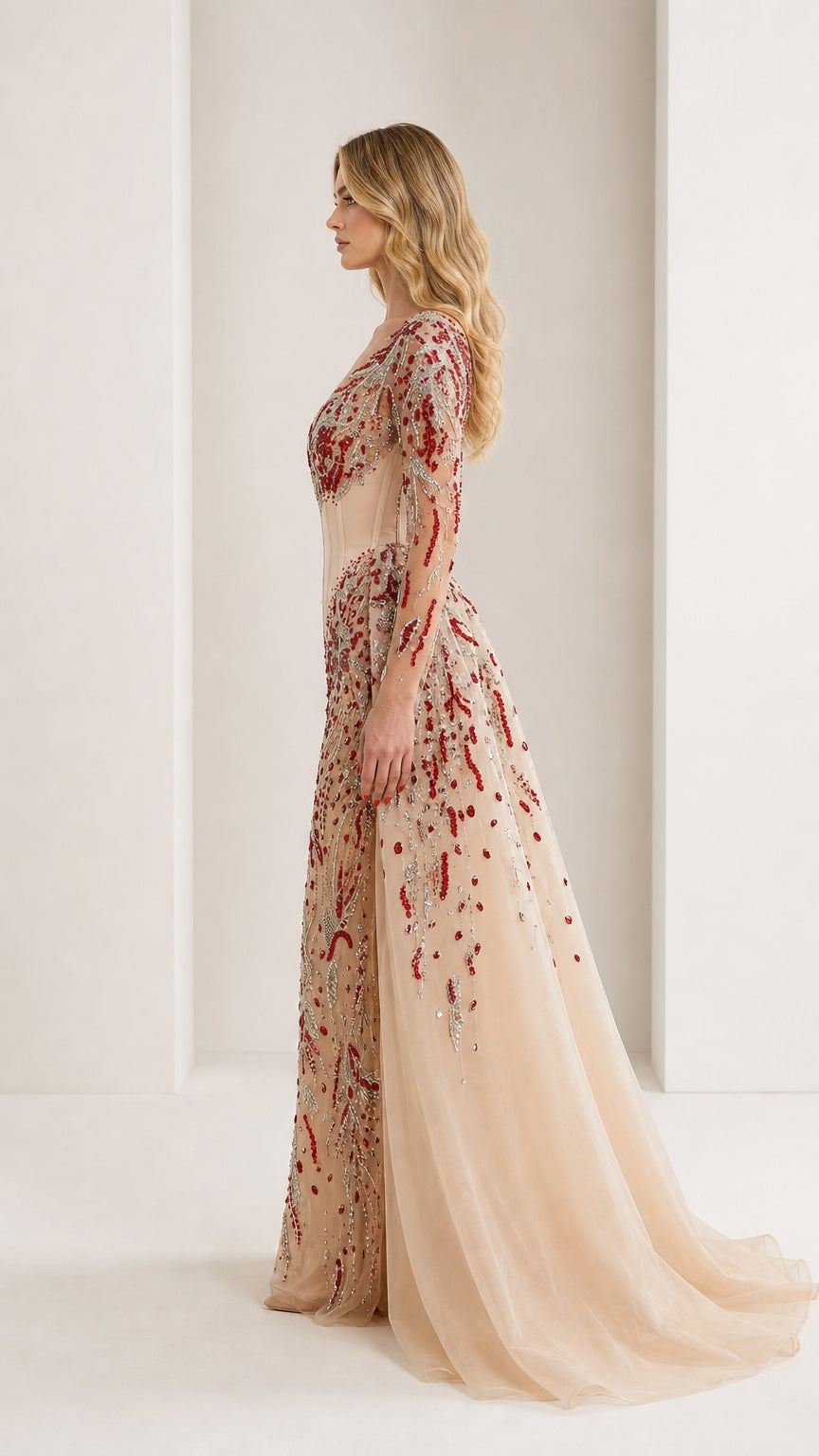 Side profile view of the nude beaded evening gown