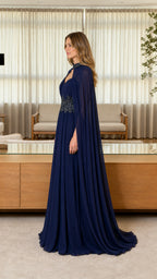 Side profile view of navy blue cape gown