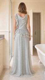 Back view showcasing draped cowl back and tiered ruffles