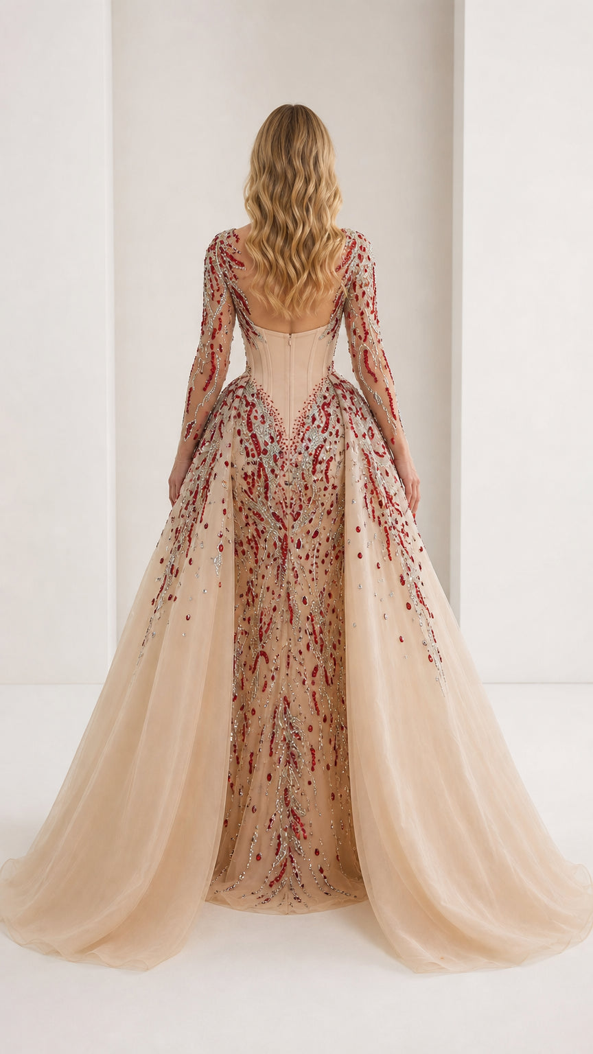 Back view showing sweeping train of the beaded gown