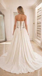 Back view of ivory gown with lace-up corset detail