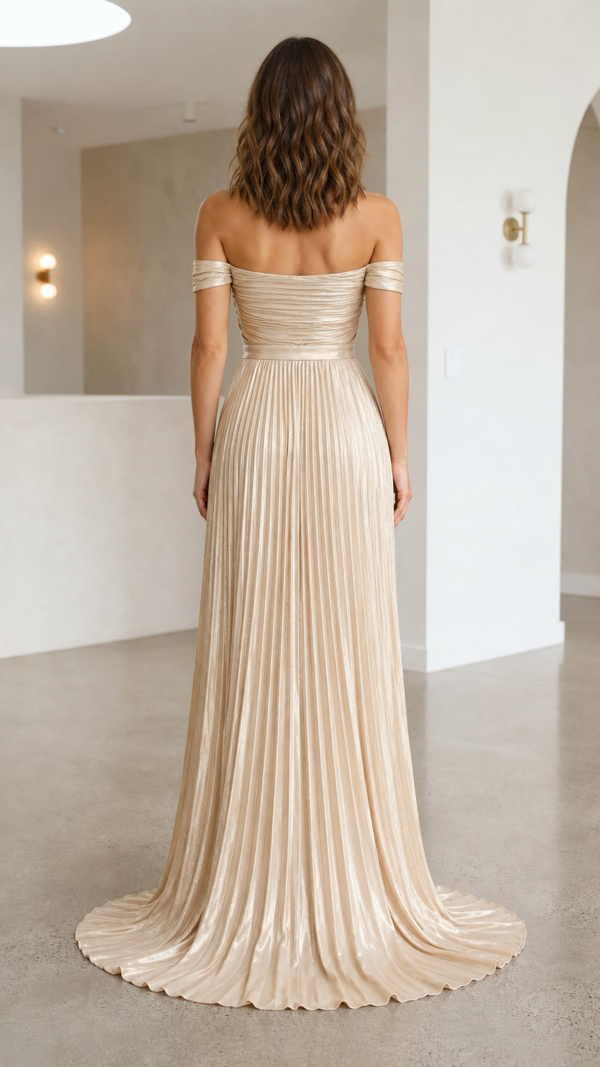Back view of champagne maxi dress with sweep train