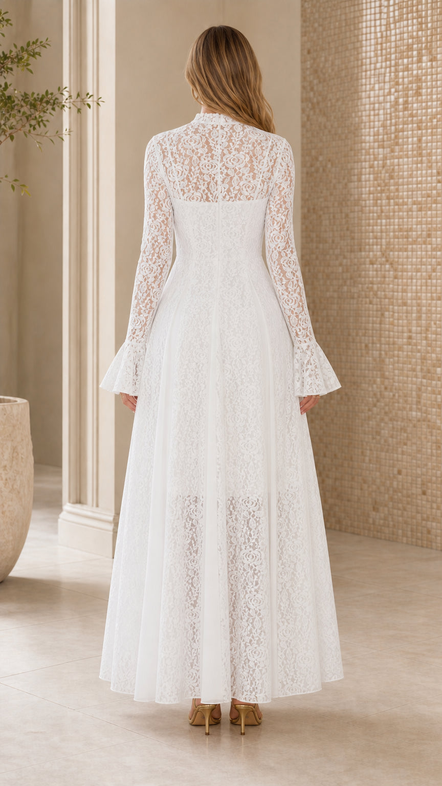 Back view of white lace maxi dress showing flared sleeves
