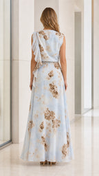 Back view of model in Light Blue floral maxi dress showing shoulder details
