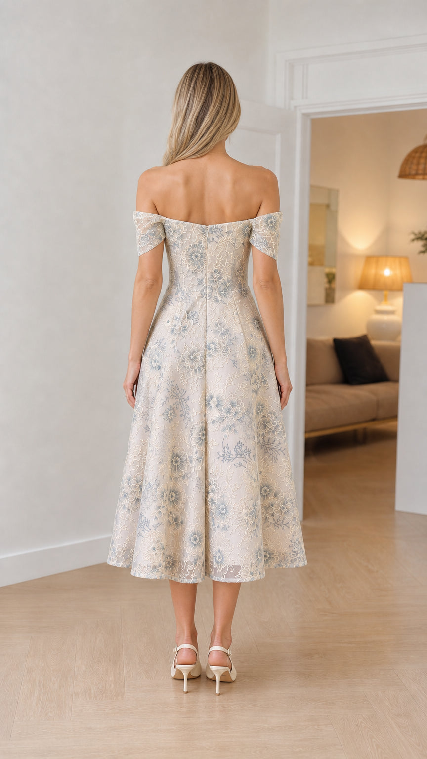 Back view of model in Champagne off-shoulder midi dress