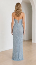 Back view showcasing lace-up detail of light blue evening dress