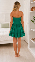Back view of green strapless bow dress