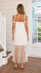 Back view of white tassel midi dress