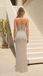Back view showing lace-up corset detail on champagne evening dress