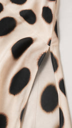 Close-up detail of fabric texture and side slit construction