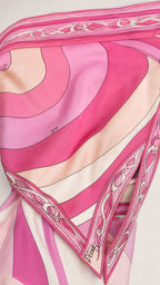 Close-up detail of the pink swirl patterned fabric and finish
