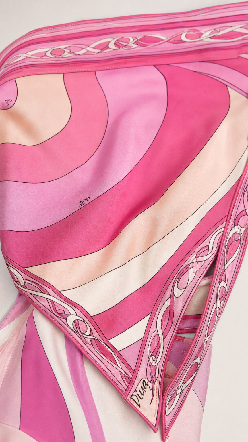 Close-up detail of the pink swirl patterned fabric and finish
