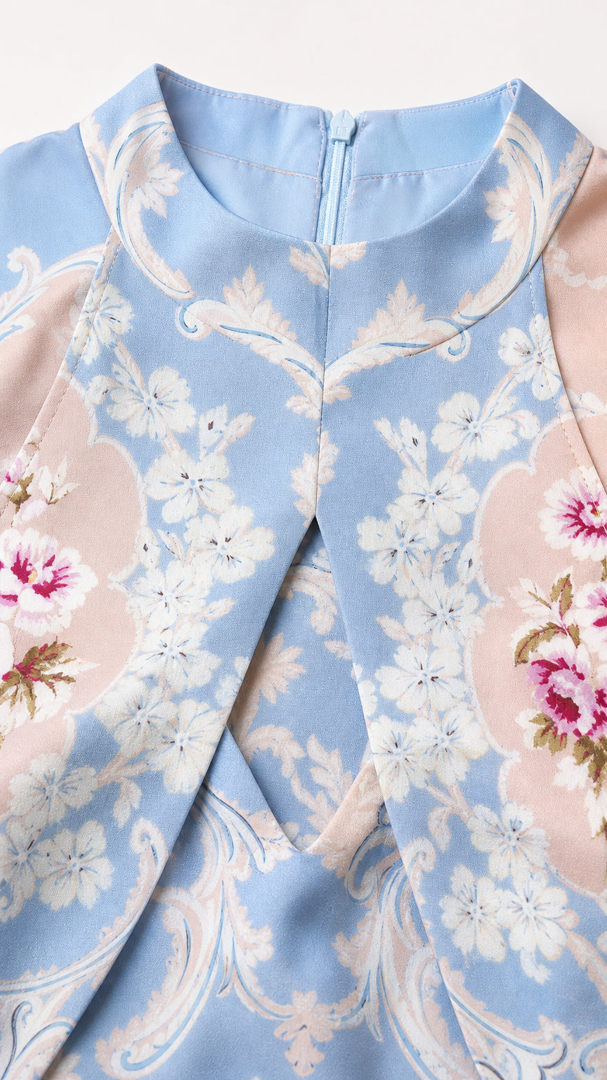 Close-up detail of halter neckline, keyhole, and fabric texture