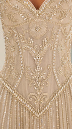 Close-up detail of bodice embroidery and beadwork