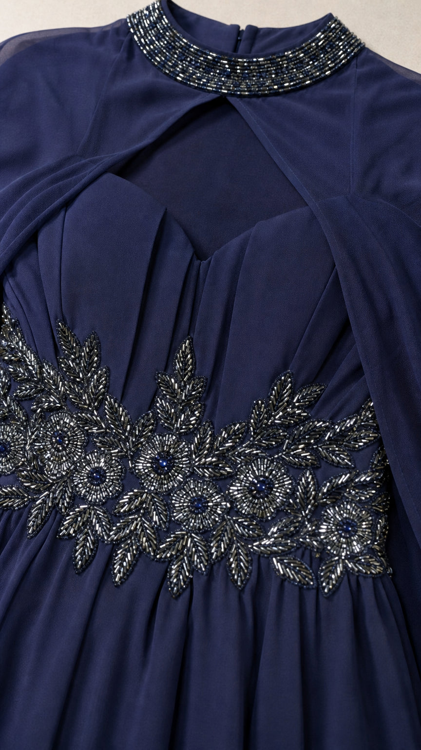 Close-up of beaded halter collar and waist embellishment
