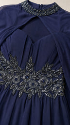 Close-up of beaded halter collar and waist embellishment