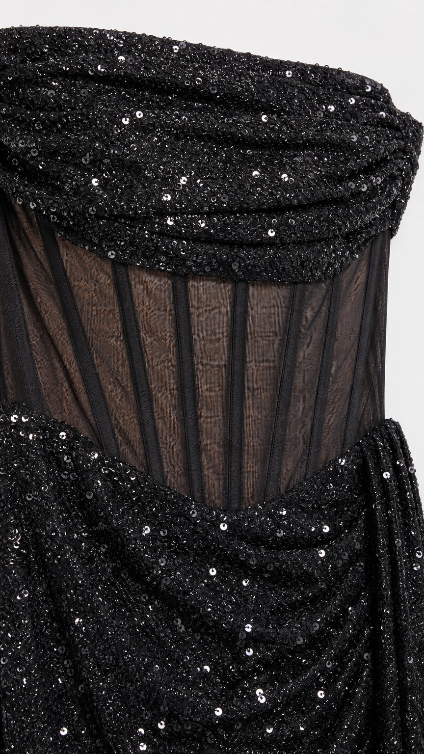 Close-up detail of strapless neckline and sheer boned bodice