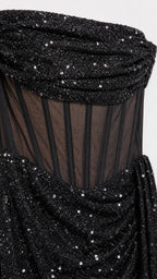 Close-up detail of strapless neckline and sheer boned bodice