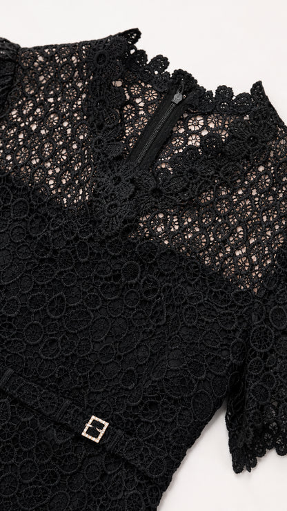 Close-up detail of upper bodice and lace texture