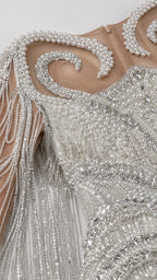 Close-up detail of the pearl and crystal bodice embroidery