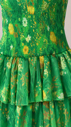 Close-up detail of smocked bodice and tiered ruffles